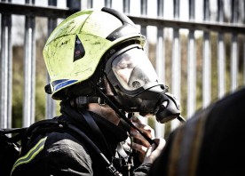 Firefighter wearing helmet