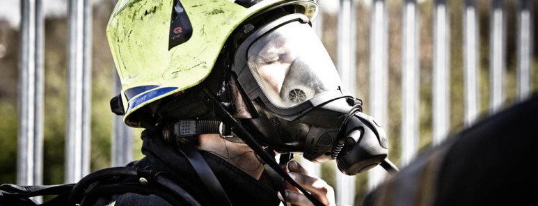 Firefighter wearing helmet